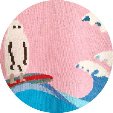 A close up image of a knitted ghost figure surfing on the big waves, a thumbnail.