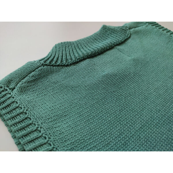 A close up shot of a dark mint coloured knit vest, showing the nape side of the product.