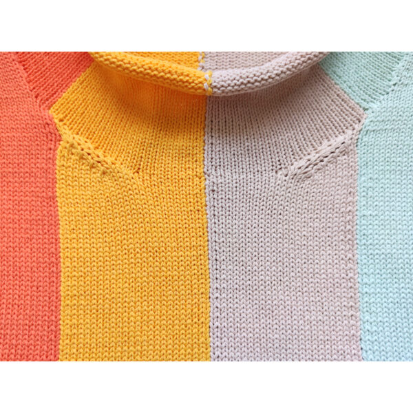 A close up shot of the rainbow coloured knit vest, focusing on the neck part.