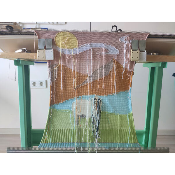 A work in progress shot of the ''Not Your Protein'' sweater on the vintage kintage machine, in the studio.