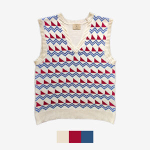 The catalogue shot of a fair isle knit vest, featuring the colours beige, red and blue.