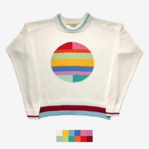 The catalogue shot of an colourful intarsia sweater, featuring a circle of many colors on the front center.