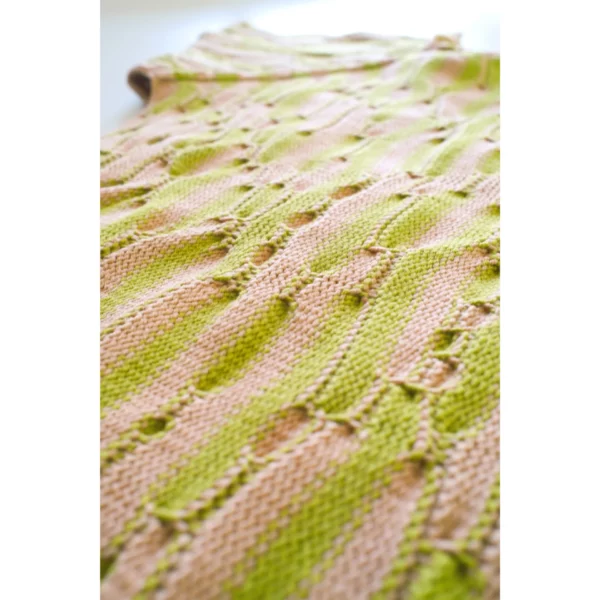 A close-up shot of the inside of Breezer (Caramel), highlighting the careful craftsmanship of the threads. The intricate connections and detailed knitting technique are beautifully captured, showcasing the skill and precision behind this handmade piece.