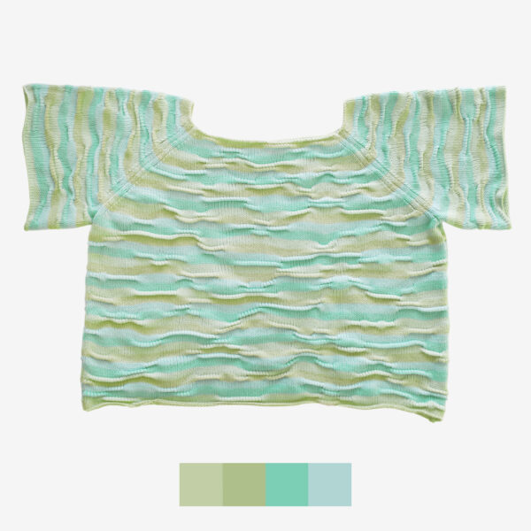 The catalog shot of Breezer (Mint), a handmade knit t-shirt with a bumpy texture, crafted with a unique knitting technique, in Minty Ice Blue and Muted Olive, made by Knytworks.