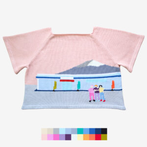 Catalogue photo of the intarsia knit t-shirt Konbini, featuring a scene of people posing in front of a konbini with Mount Fuji in the background, by Knyt.